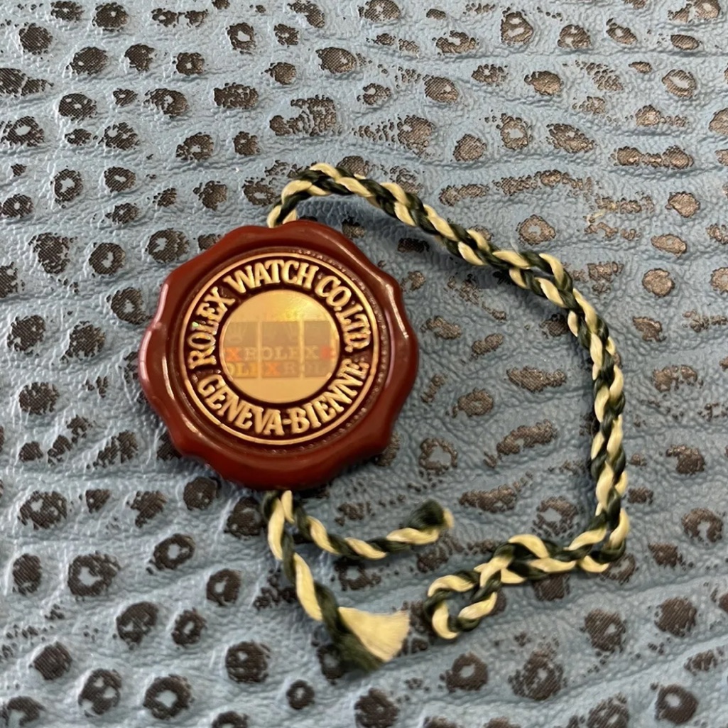 Authentic Rolex Red Hang Tag Single Crown Hologram Certified Chronomet